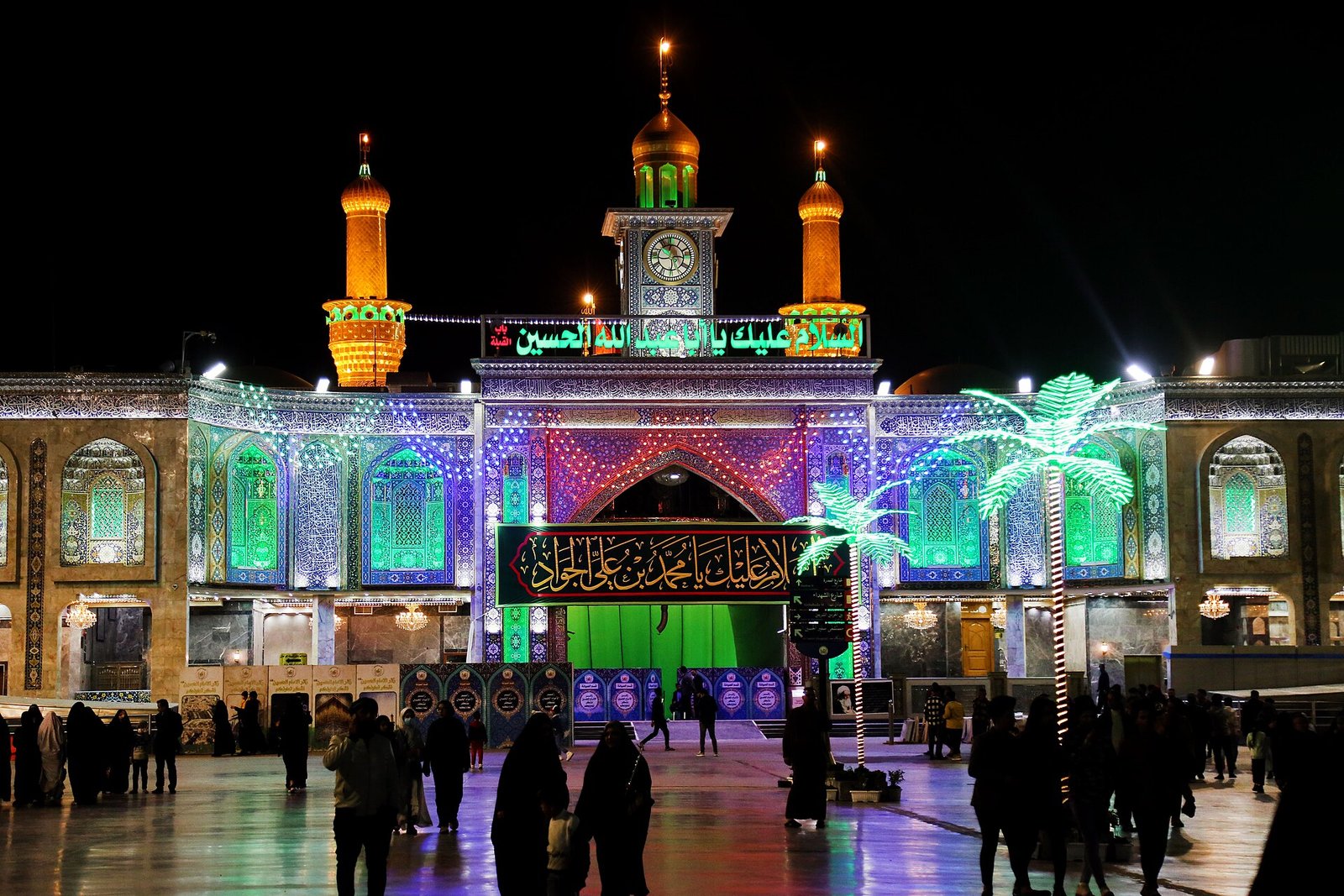Shrine of Imam Hussain seen from Bayn al-Haramayn at night, Karbala